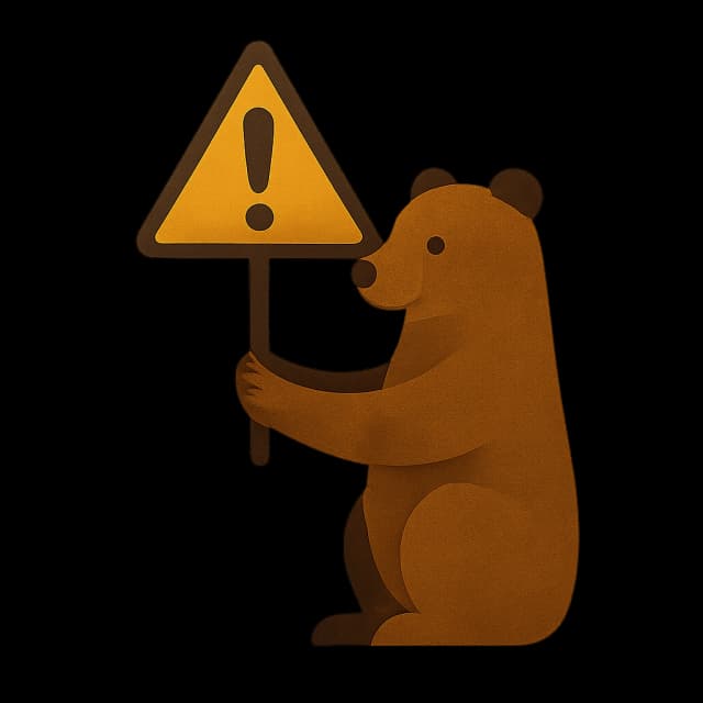 The chenook bear holding a warning sign